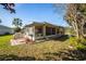 Spacious backyard with screened patio, perfect for outdoor entertaining at 11116 Jenkins Ct, San Antonio, FL 33576