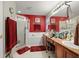 Bathroom with double vanity, shower, and tub at 11116 Jenkins Ct, San Antonio, FL 33576