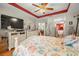 Spacious bedroom with dresser and large TV at 11116 Jenkins Ct, San Antonio, FL 33576