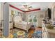 Main bedroom with wood floors and a stylish dresser at 11116 Jenkins Ct, San Antonio, FL 33576
