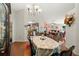Open dining room with view of kitchen and living areas at 11116 Jenkins Ct, San Antonio, FL 33576