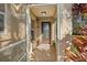 Front entrance with a screened porch and decorative flooring at 11116 Jenkins Ct, San Antonio, FL 33576