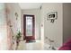 Inviting entryway with a stained glass door and decor at 11116 Jenkins Ct, San Antonio, FL 33576
