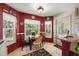 Cozy kitchen nook with a table and chairs, overlooking the backyard at 11116 Jenkins Ct, San Antonio, FL 33576
