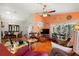 Open living room featuring a view into dining area and sliding glass doors at 11116 Jenkins Ct, San Antonio, FL 33576