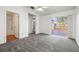 Main bedroom with access to bathroom and private deck at 1216 Cressford Pl, Brandon, FL 33511