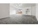 Spacious living area with grey carpet and high ceilings at 1216 Cressford Pl, Brandon, FL 33511
