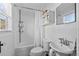 Clean bathroom with white subway tiles and a shower/tub combo at 1223 13Th N St, St Petersburg, FL 33705