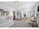 Bright and airy living room with a white fireplace, hardwood floors, and comfy seating at 1223 13Th N St, St Petersburg, FL 33705