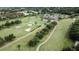 Aerial view of golf course with clubhouse at 12300 Vonn Rd # 6103, Largo, FL 33774