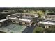 Aerial view of Villas de Golf community, showing tennis courts and pool at 12300 Vonn Rd # 6103, Largo, FL 33774
