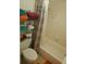 Bathroom with toilet, tub, shower, and storage at 12300 Vonn Rd # 6103, Largo, FL 33774