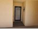 Condo building entrance with security door at 12300 Vonn Rd # 6103, Largo, FL 33774