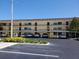 Condo building with covered parking and landscaping at 12300 Vonn Rd # 6103, Largo, FL 33774
