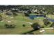Aerial view of the lush golf course adjacent to the community at 12300 Vonn Rd # 6103, Largo, FL 33774