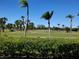 Peaceful view of the golf course and lush landscaping at 12300 Vonn Rd # 6103, Largo, FL 33774