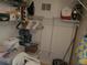 Well-organized laundry room with shelving and storage at 12300 Vonn Rd # 6103, Largo, FL 33774