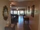 Open living area with dining space and view to lanai at 12300 Vonn Rd # 6103, Largo, FL 33774