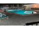 Inviting community pool at night, ready for a relaxing evening swim at 12300 Vonn Rd # 6103, Largo, FL 33774