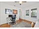 Spacious home office with wood floors and two work stations at 213 W Cayuga St, Tampa, FL 33603
