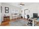 Bright home office features wood floors, built-in washer dryer, and ample workspace at 213 W Cayuga St, Tampa, FL 33603