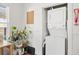 Convenient laundry closet with stackable washer and dryer at 213 W Cayuga St, Tampa, FL 33603