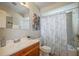 Clean bathroom with shower/tub combo at 2209 Gladys St, Largo, FL 33774