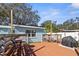 Backyard deck with seating and grill at 2209 Gladys St, Largo, FL 33774