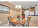 Dining area with a view into the kitchen at 2279 Portofino Pl # 20-2025, Palm Harbor, FL 34683