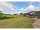 Spacious backyard with golf course view at 2337 Platinum Dr, Sun City Center, FL 33573
