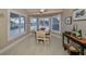 Bright breakfast nook with window seat overlooking the pool at 2337 Platinum Dr, Sun City Center, FL 33573