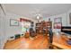 Spacious home office with built-in shelving and hardwood floors at 2337 Platinum Dr, Sun City Center, FL 33573