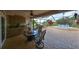Outdoor patio with seating area, hot tub, and water view at 2337 Platinum Dr, Sun City Center, FL 33573
