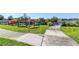 Community kayak launch with multiple kayaks and a scenic walkway at 2460 Persian Dr # 26, Clearwater, FL 33763