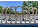 Elegant archway structure with columns and landscaping at 2460 Persian Dr # 26, Clearwater, FL 33763