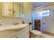Standard bathroom featuring vanity with mirror and shower with sliding door at 2460 Persian Dr # 26, Clearwater, FL 33763