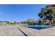 Inviting community pool with ample deck space at 2460 Persian Dr # 26, Clearwater, FL 33763