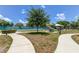 Relaxing courtyard with walking paths and picnic tables at 2460 Persian Dr # 26, Clearwater, FL 33763
