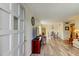 Spacious living room featuring wood-look floors and an open concept layout at 2460 Persian Dr # 26, Clearwater, FL 33763