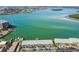 Aerial view of waterfront building with parking at 250 126Th Ave # 206, Treasure Island, FL 33706