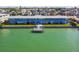Aerial view of waterfront property with private dock at 250 126Th Ave # 206, Treasure Island, FL 33706