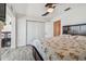 Bright bedroom with double bed and access to a walk-in closet at 250 126Th Ave # 206, Treasure Island, FL 33706