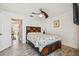 Bright bedroom with a double bed and access to hallway at 250 126Th Ave # 206, Treasure Island, FL 33706