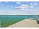 Waterfront dock with seating area overlooking the water at 250 126Th Ave # 206, Treasure Island, FL 33706