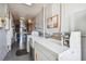 Shared laundry room with multiple washers and dryers at 250 126Th Ave # 206, Treasure Island, FL 33706