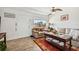 Living room features a light and airy feel, comfy seating, and a view to the outdoors at 250 126Th Ave # 206, Treasure Island, FL 33706