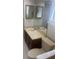 Bathroom with a single sink vanity and standard toilet at 2593 Countryside Blvd # 7213, Clearwater, FL 33761