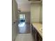 Bathroom with vanity and view of living room at 2593 Countryside Blvd # 7213, Clearwater, FL 33761