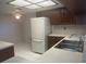 Functional kitchen area with ample counter space, adjacent to dining area, and modern appliances at 2593 Countryside Blvd # 7213, Clearwater, FL 33761