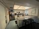 Cozy kitchen with stainless steel appliances, granite countertops, and modern fixtures at 2593 Countryside Blvd # 7213, Clearwater, FL 33761